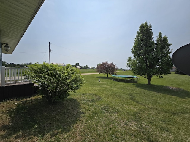 626 W Finerty Rd, West Branch, MI 48661 - view of grassy yard with a trampoline