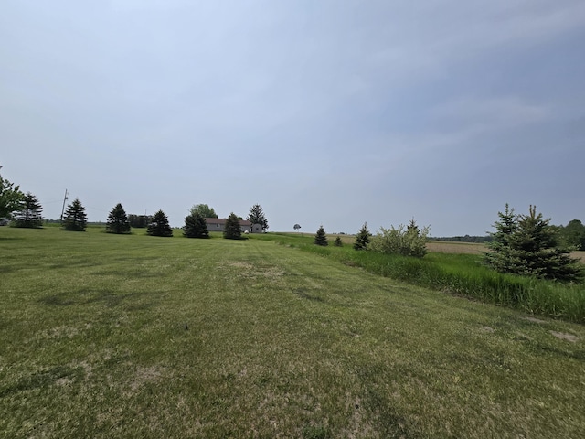 626 W Finerty Rd, West Branch, MI 48661 - view of green lawn featuring a rural view