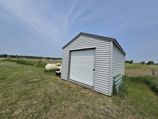 626 W Finerty Rd, West Branch, MI 48661 - view of shed featuring a view of rural / pastoral area