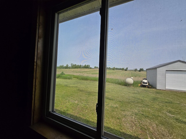 626 W Finerty Rd, West Branch, MI 48661 - view of green lawn with a storage unit and a rural view