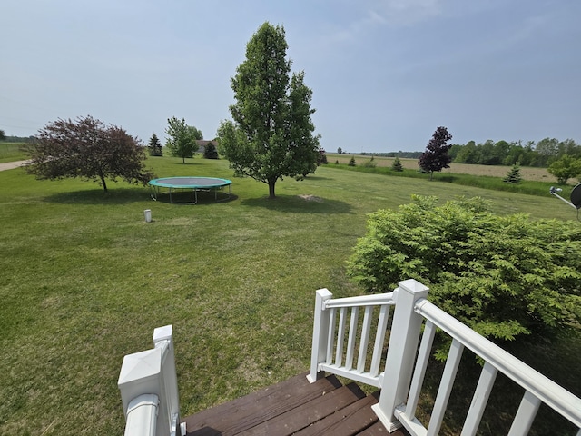 626 W Finerty Rd, West Branch, MI 48661 - view of green lawn with a trampoline and a rural view