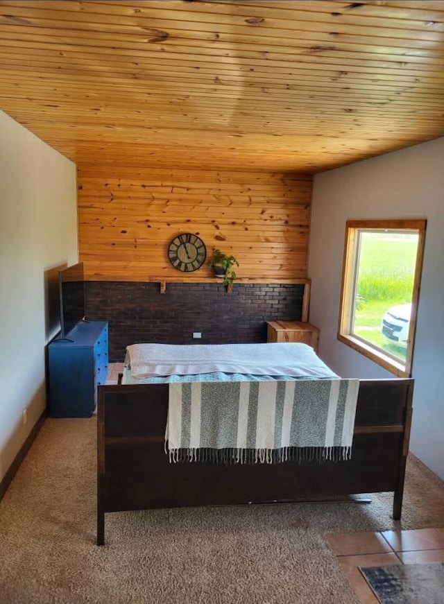 626 W Finerty Rd, West Branch, MI 48661 - bedroom with wood ceiling, carpet floors, and wood walls
