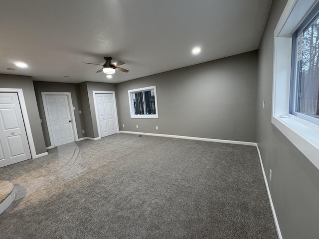 unfurnished living room with ceiling fan, baseboards, carpet flooring, and recessed lighting