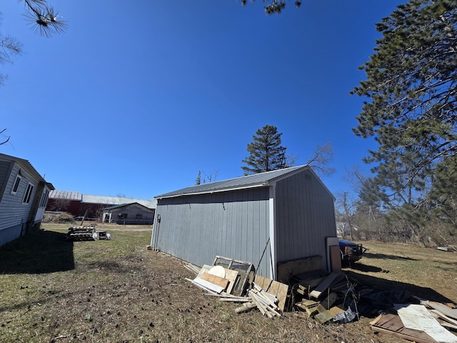 2051 Stutesman Dr, Fairview, MI 48621 - view of outbuilding with an outbuilding
