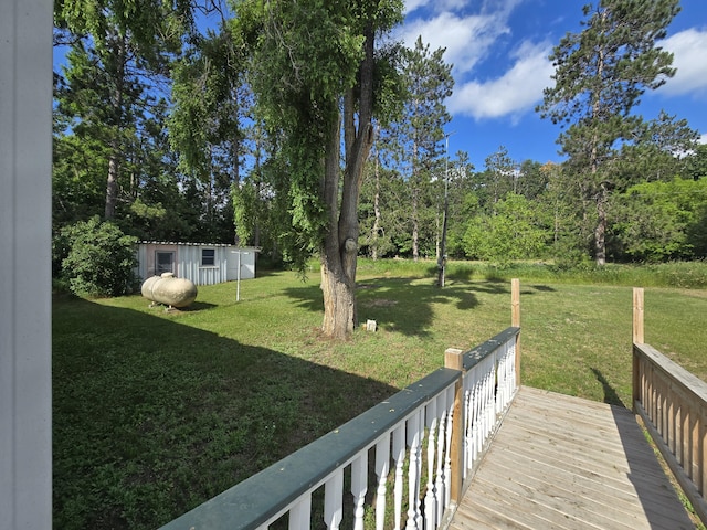 2051 Stutesman Dr, Fairview, MI 48621 - view of green lawn featuring an outdoor structure