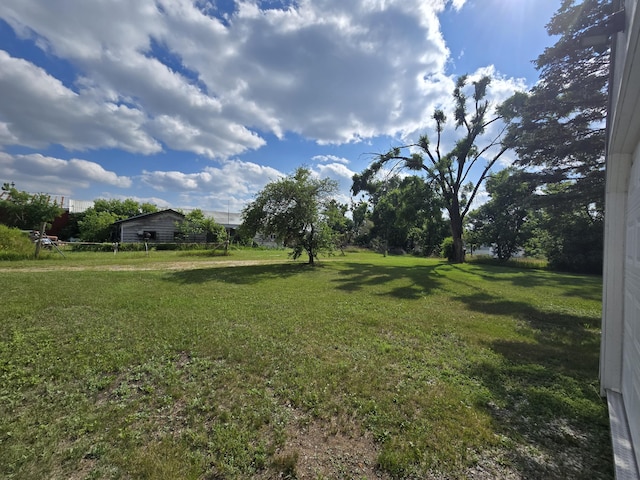 2051 Stutesman Dr, Fairview, MI 48621 - view of grassy yard
