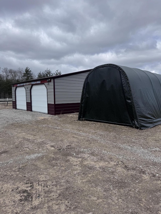 view of outbuilding with an outbuilding