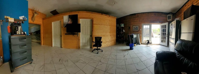 living area with vaulted ceiling