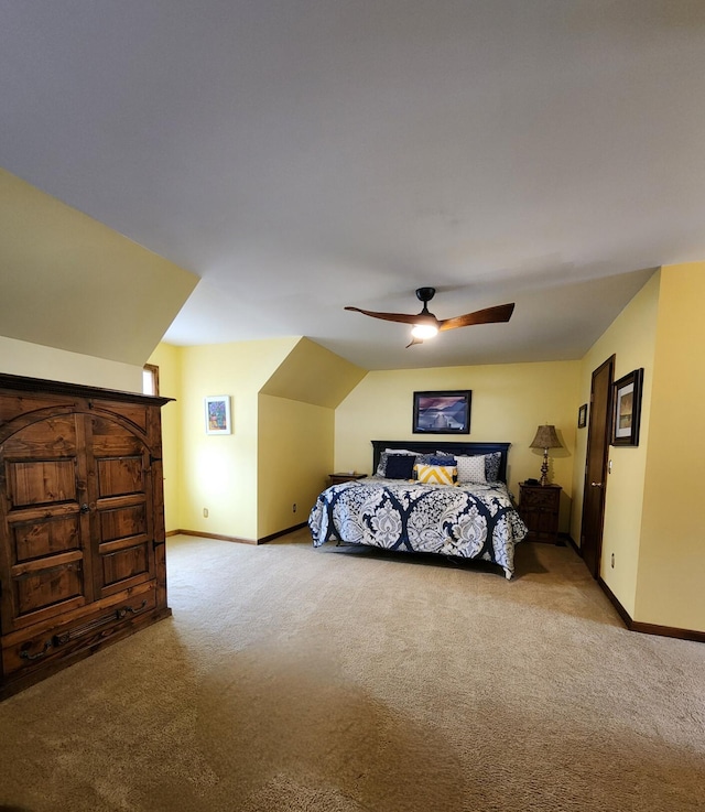 bedroom with ceiling fan, baseboards, and carpet