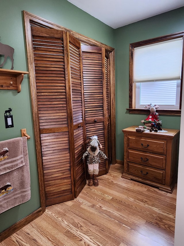 interior space featuring a closet and light wood-style floors