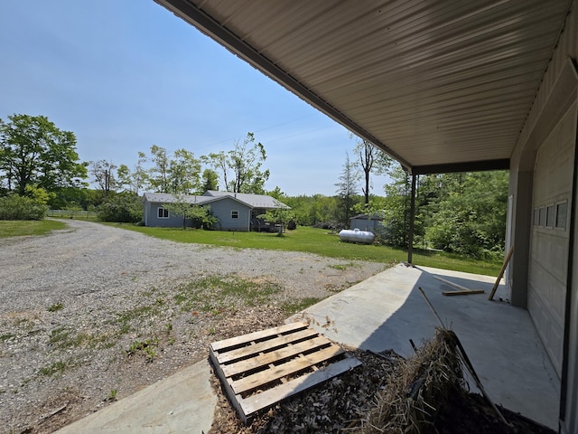 1793 W Kittle Rd, Mio, MI 48647 - view of grassy yard featuring a patio area