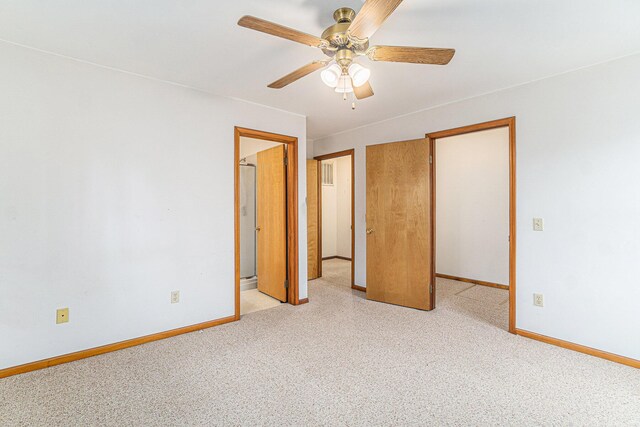 4640 Hiawatha Dr, Cheboygan, MI 49721 - unfurnished bedroom with baseboards, a ceiling fan, and carpet