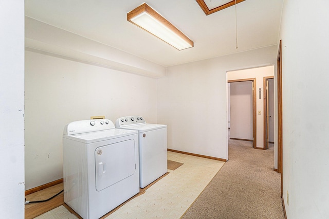 4640 Hiawatha Dr, Cheboygan, MI 49721 - laundry area with attic access, laundry area, light floors, and washer and clothes dryer