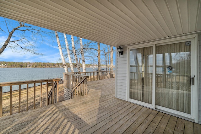 4640 Hiawatha Dr, Cheboygan, MI 49721 - wooden terrace with a water view