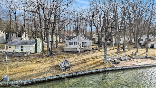 4640 Hiawatha Dr, Cheboygan, MI 49721 - view of dock with a residential view and a water view
