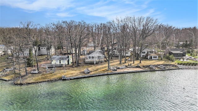 4640 Hiawatha Dr, Cheboygan, MI 49721 - exterior space with a residential view and a water view