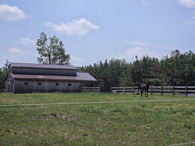 1300 N Perry Creek Rd, Fairview, MI 48621 - view of yard with an outbuilding and a pole building