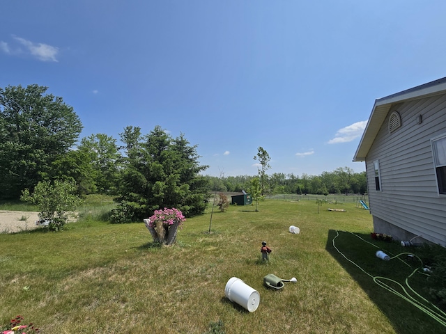 1300 N Perry Creek Rd, Fairview, MI 48621 - view of green lawn