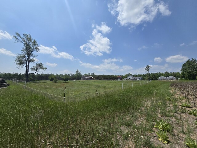 1300 N Perry Creek Rd, Fairview, MI 48621 - view of yard with a view of countryside
