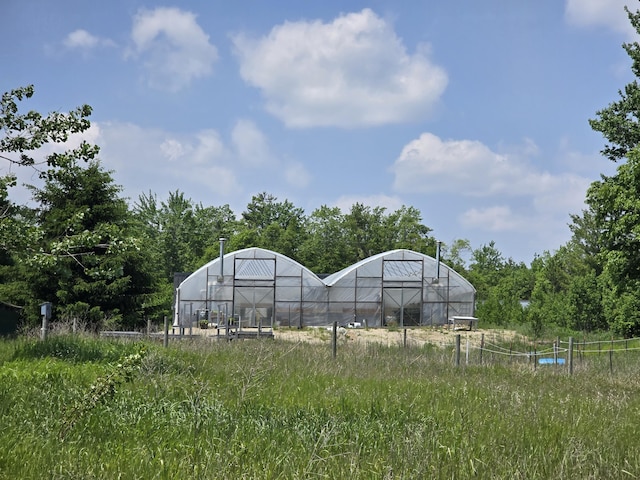 1300 N Perry Creek Rd, Fairview, MI 48621 - view of yard with an exterior structure and an outdoor structure