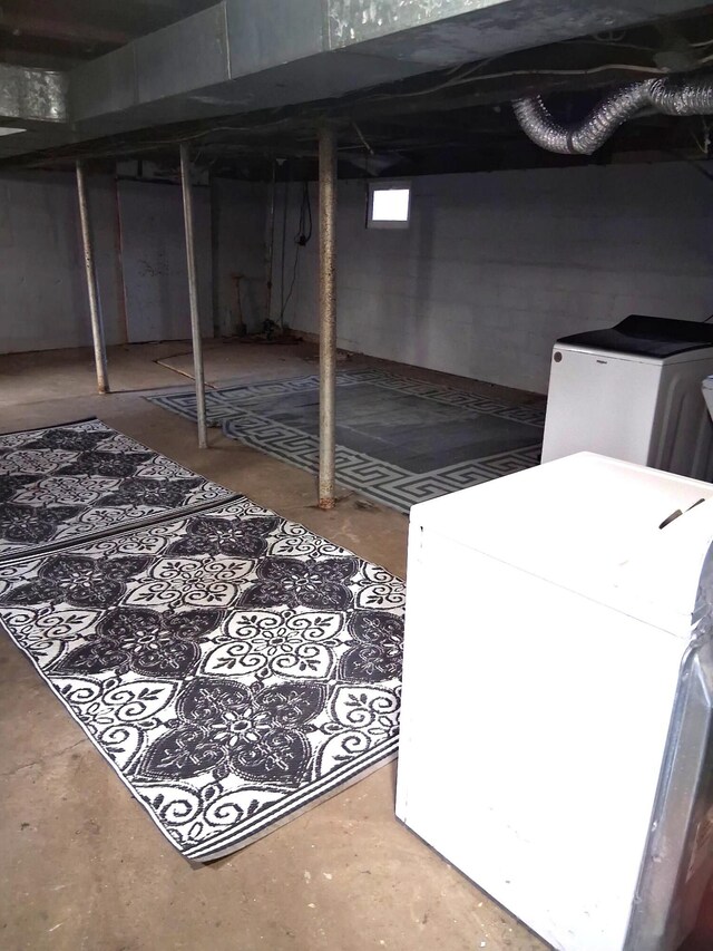 3468 W Nye Rd, Hessel, MI 49745 - below grade area featuring washer / dryer