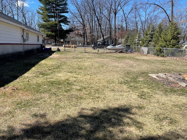view of yard featuring fence