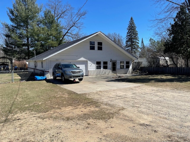 view of side of home with fence