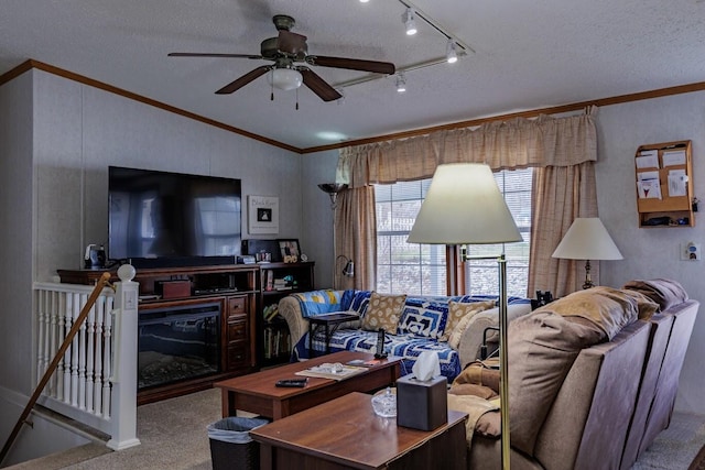 carpeted living area featuring lofted ceiling, ceiling fan, a textured ceiling, and ornamental molding
