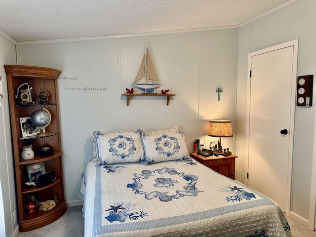 10525 Alpenhof Dr, Grayling, MI 49738 - bedroom featuring carpet floors, ornamental molding, and a textured ceiling