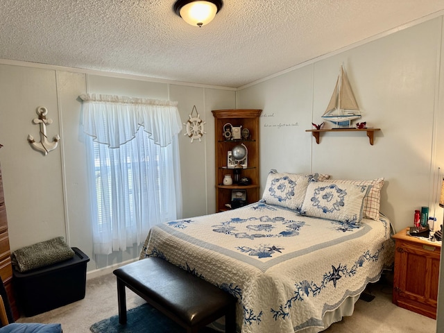 10525 Alpenhof Dr, Grayling, MI 49738 - carpeted bedroom with a textured ceiling and ornamental molding