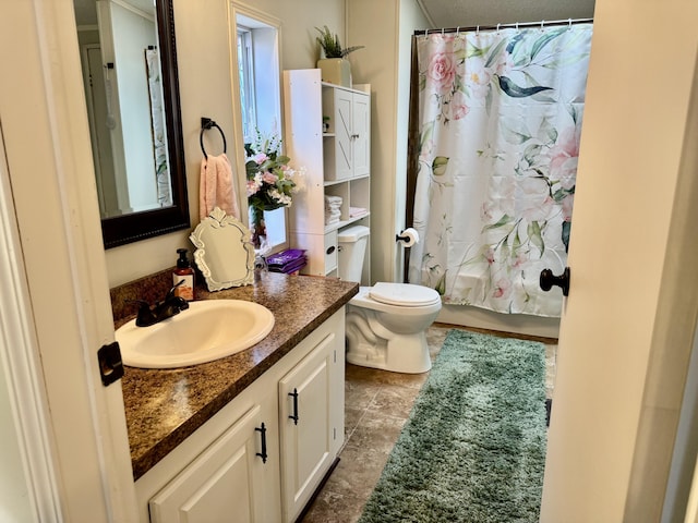 10525 Alpenhof Dr, Grayling, MI 49738 - bathroom with vanity, toilet, and shower / tub combo