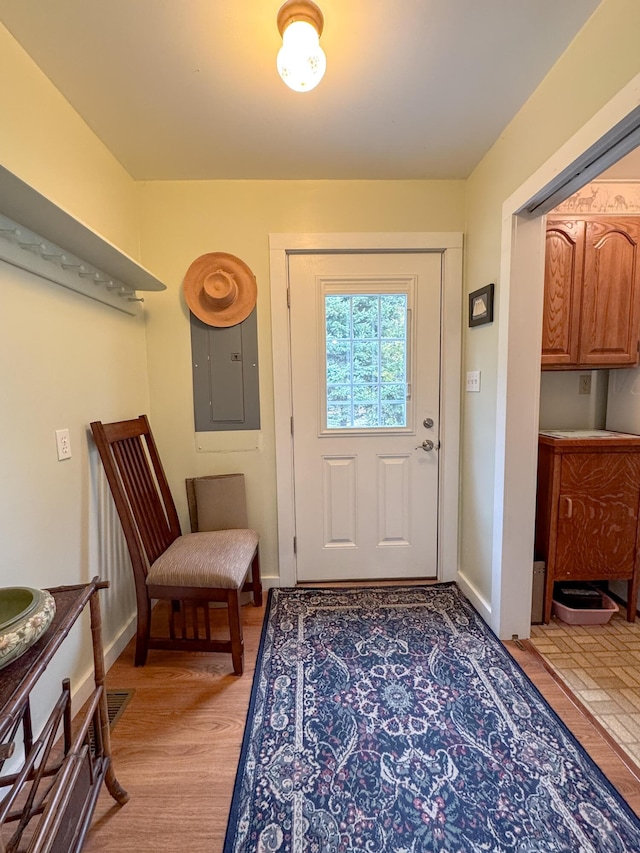 1220 N Lake Huron Shore Dr, Harrisville, MI 48740 - doorway with baseboards and electric panel