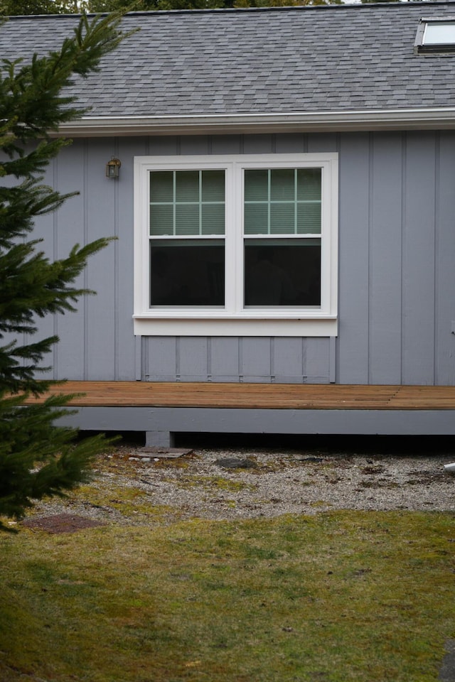 1220 N Lake Huron Shore Dr, Harrisville, MI 48740 - view of side of property with roof with shingles and board and batten siding