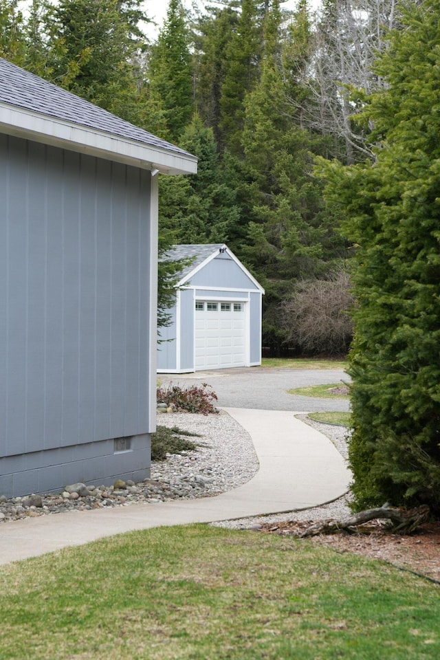 1220 N Lake Huron Shore Dr, Harrisville, MI 48740 - view of side of home with an outdoor structure and crawl space