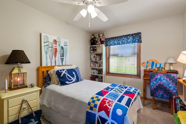 bedroom with ceiling fan and carpet