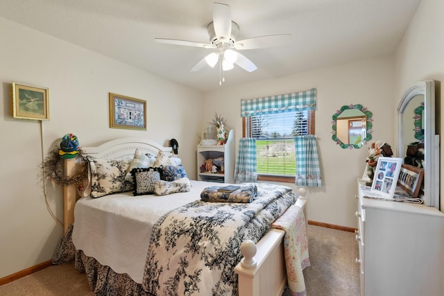 bedroom with baseboards, ceiling fan, and light colored carpet