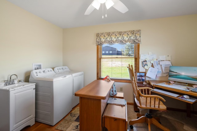 laundry room featuring washer and clothes dryer, laundry area, a sink, and a ceiling fan