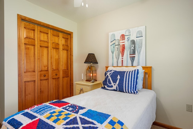 bedroom with ceiling fan and carpet