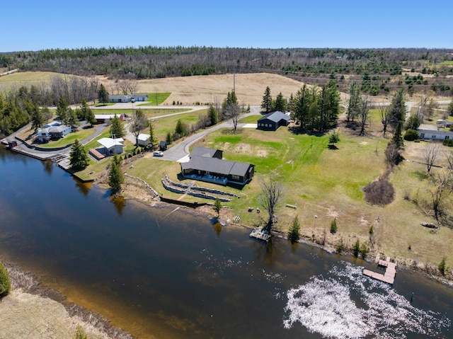 drone / aerial view featuring a rural view and a water view