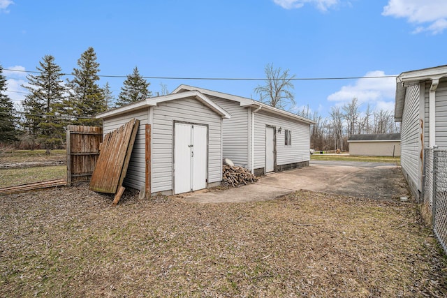 1580 Bancroft St, Cheboygan, MI 49721 - view of outbuilding with an outbuilding and fence
