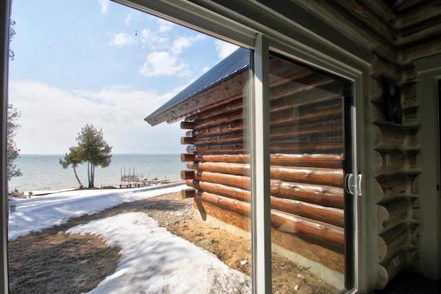 exterior space with a water view