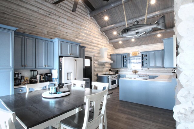 kitchen with high end appliances, glass insert cabinets, wood ceiling, wall chimney range hood, and high vaulted ceiling