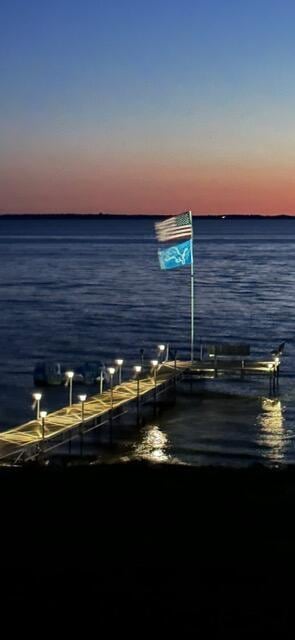 property view of water featuring a dock