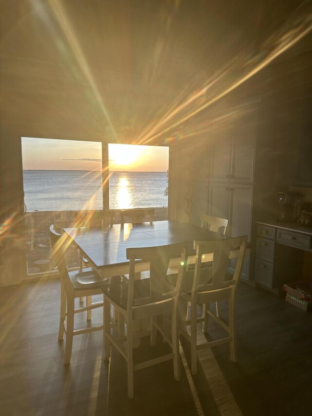 dining space with a water view