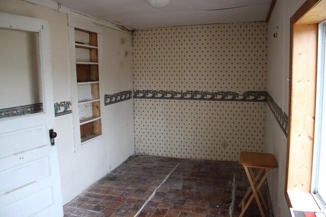 interior space with brick floor