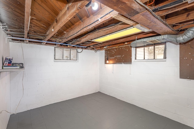 below grade area featuring dark floors