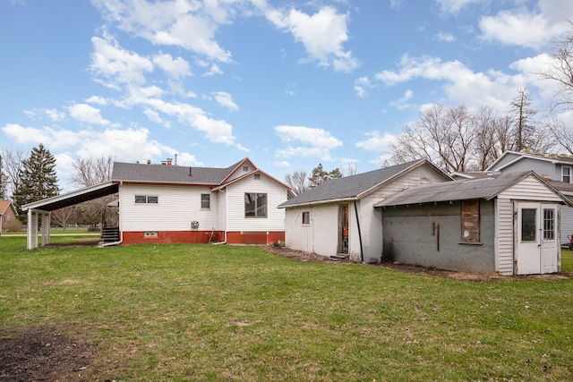 back of house with a yard