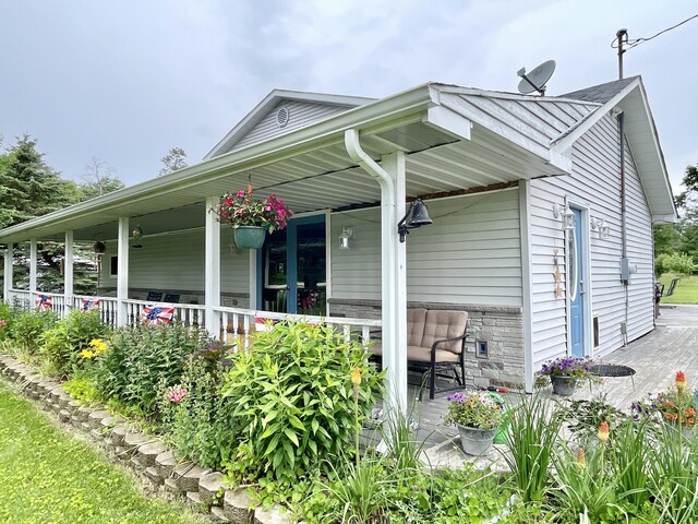 exterior space featuring covered porch