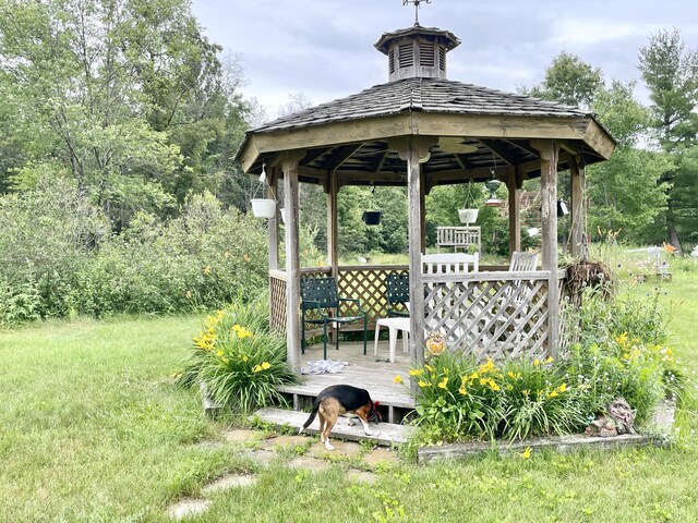 wooden terrace with a gazebo