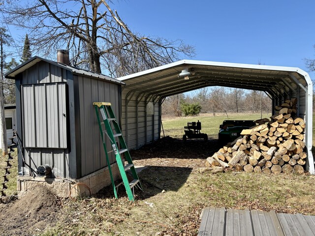 view of shed featuring a carport
